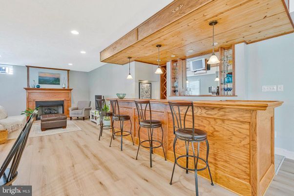 Fireplace, Interior, Pendant Lights, Recessed Lighting, Wooden Ceilings, Wood Texture Flooring