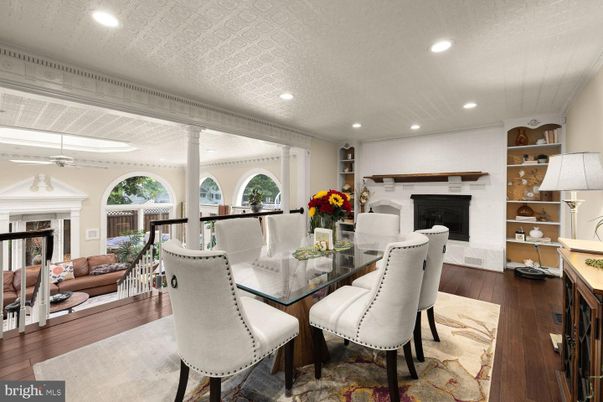 Dining room, Fireplace, Interior, Living room, Recessed Lighting, Wood Texture Flooring