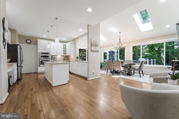 Chandelier, Dining room, Interior, Kitchen, Pendant Lights, Recessed Lighting, Stainless Steel Appliances, Wood Texture Flooring