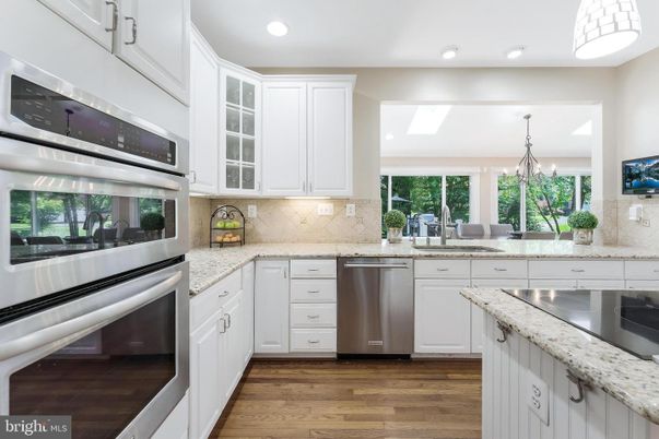 Chandelier, Interior, Kitchen, Recessed Lighting, Stainless Steel Appliances, Wood Texture Flooring