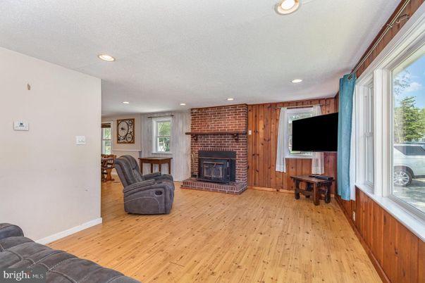 Fireplace, Interior, Recessed Lighting, Stone Walls, Wood Texture Flooring, Wooden Walls