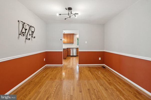 Empty room, Interior, Kitchen, Stainless Steel Appliances, Wood Texture Flooring