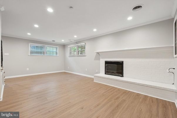 Empty room, Fireplace, Interior, Recessed Lighting, Wood Texture Flooring