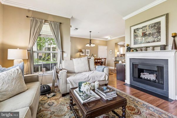 Chandelier, Dining room, Fireplace, Interior, Living room, Pendant Lights, Wood Texture Flooring