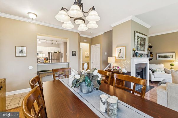 Chandelier, Dining room, Fireplace, Interior, Kitchen, Living room, Stainless Steel Appliances, Wood Texture Flooring