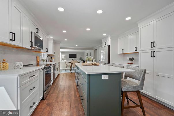 Dining room, Interior, Kitchen, Recessed Lighting, Stainless Steel Appliances, Wood Texture Flooring