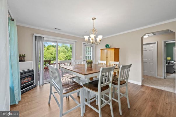 Chandelier, Dining room, Fireplace, Interior, Wood Texture Flooring