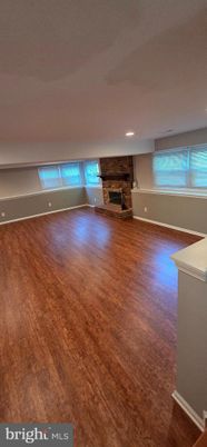Empty room, Fireplace, Interior, Recessed Lighting, Wood Texture Flooring