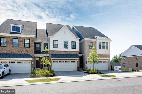 Attached, Exterior, Facade, Brick Facade, Rowhouse