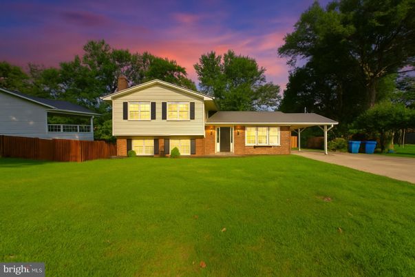 Attached, Backyard, Exterior, Facade, Brick Facade, Split Level