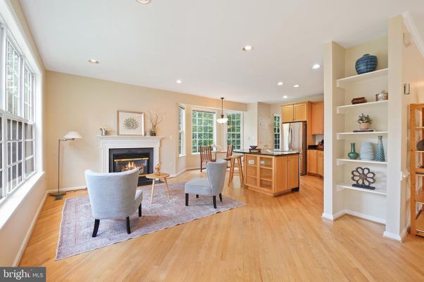 Dining room, Fireplace, Interior, Kitchen, Living room, Pendant Lights, Recessed Lighting, Stainless Steel Appliances, Wood Texture Flooring