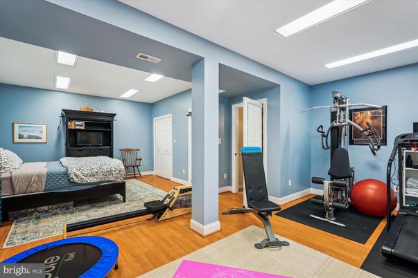 Bedroom, Fitness Equipment, Interior, Recessed Lighting, Wood Texture Flooring