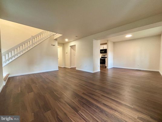 Empty room, Interior, Recessed Lighting, Stainless Steel Appliances, Wood Texture Flooring