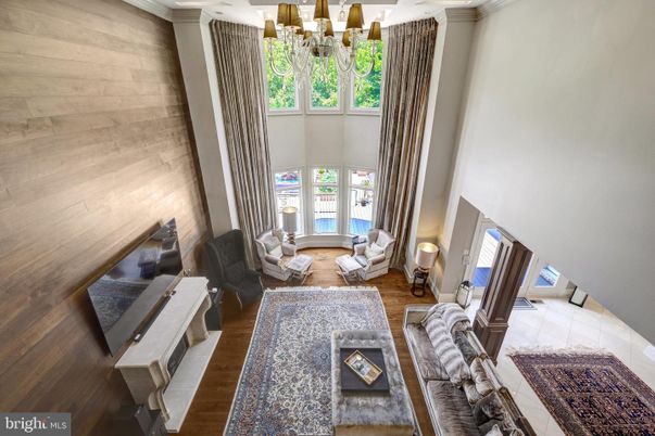Chandelier, Interior, Living room, Recessed Lighting, Wood Texture Flooring, Wooden Walls
