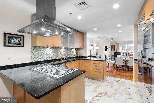 Dining room, Interior, Kitchen, Recessed Lighting, Stainless Steel Appliances, Wood Texture Flooring