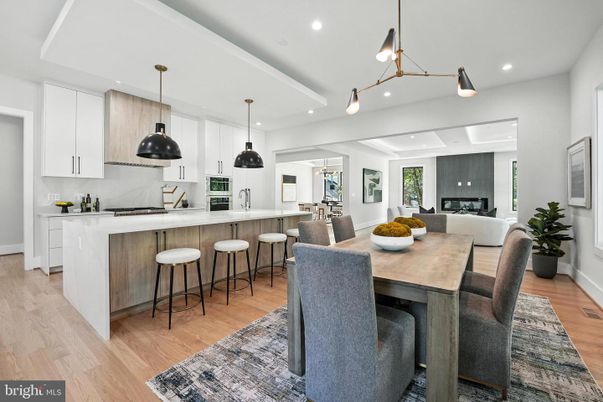 Dining room, Interior, Kitchen, Pendant Lights, Recessed Lighting, Stainless Steel Appliances, Wood Texture Flooring