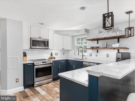 Interior, Kitchen, Pendant Lights, Recessed Lighting, Stainless Steel Appliances, Wood Texture Flooring
