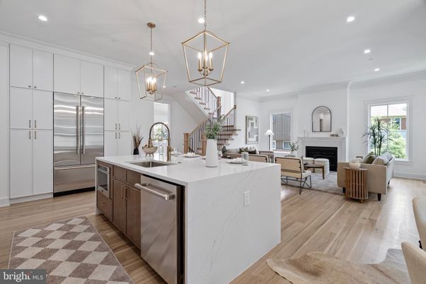 Fireplace, Interior, Kitchen, Living room, Pendant Lights, Recessed Lighting, Stainless Steel Appliances, Wood Texture Flooring