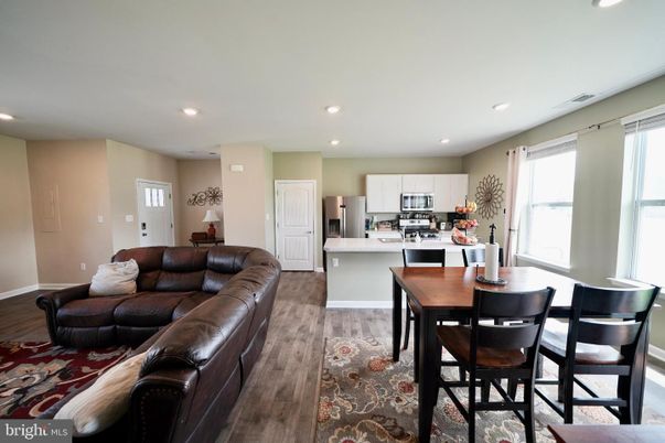 Dining room, Interior, Kitchen, Living room, Recessed Lighting, Stainless Steel Appliances, Wood Texture Flooring