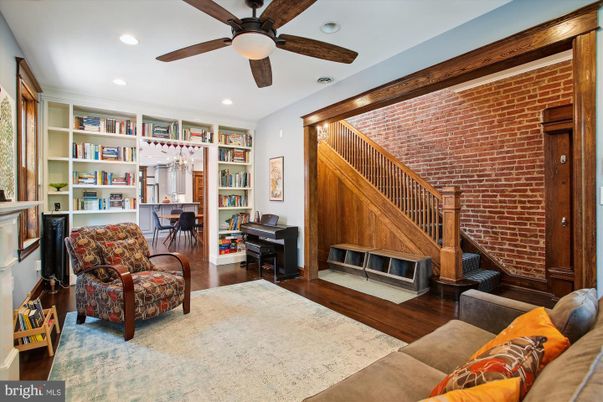 Dining room, Fireplace, Interior, Living room, Piano, Recessed Lighting, Stone Walls, Wood Texture Flooring