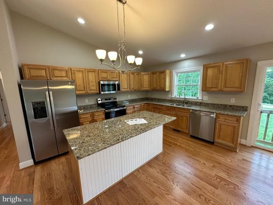 Chandelier, Interior, Kitchen, Recessed Lighting, Stainless Steel Appliances, Wood Texture Flooring
