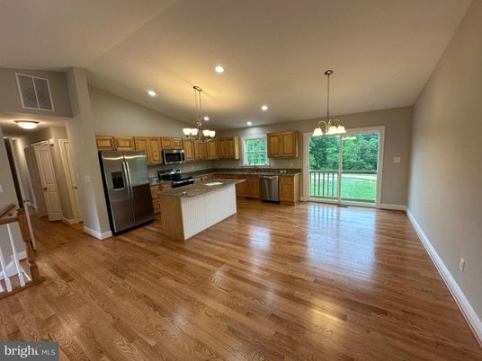 Chandelier, Interior, Kitchen, Pendant Lights, Recessed Lighting, Stainless Steel Appliances, Wood Texture Flooring
