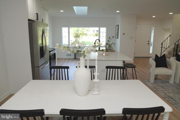 Dining room, Interior, Kitchen, Recessed Lighting, Stainless Steel Appliances, Wood Texture Flooring