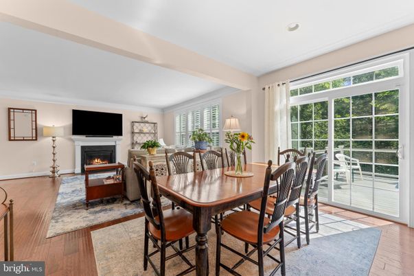 Dining room, Fireplace, Interior, Living room, Recessed Lighting, Wood Texture Flooring