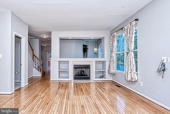Empty room, Fireplace, Interior, Recessed Lighting, Wood Texture Flooring