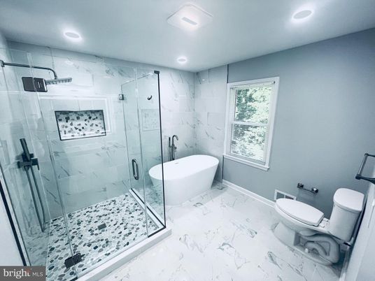 Bathroom, Free Standing Baths, Glass Shower, Interior, Marble, Marble Walls, Recessed Lighting