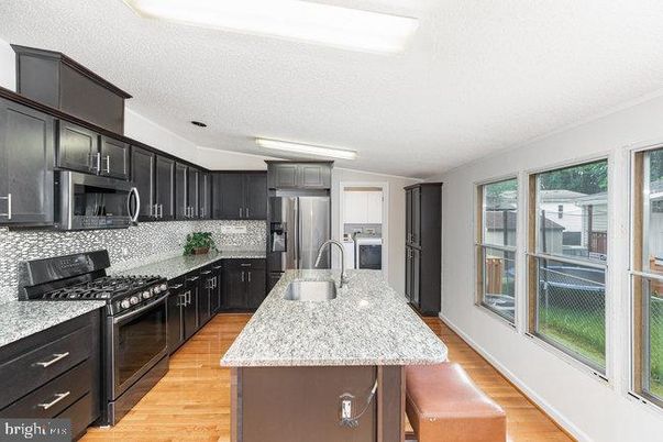 Interior, Kitchen, Stainless Steel Appliances, Wood Texture Flooring