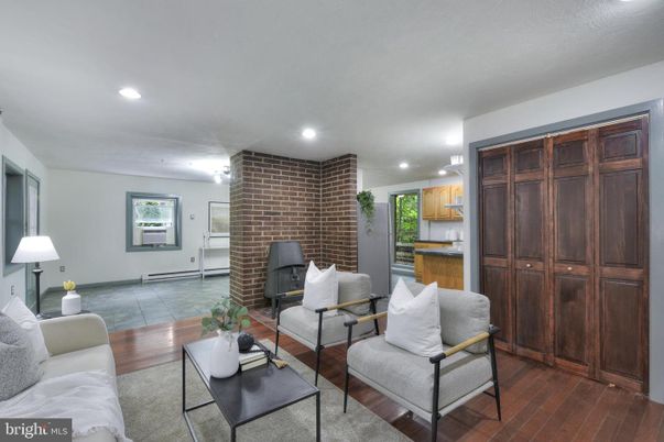 Fireplace, Interior, Living room, Recessed Lighting, Stone Walls, Wood Texture Flooring