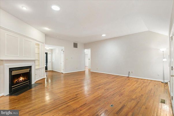 Empty room, Fireplace, Interior, Recessed Lighting, Wood Texture Flooring