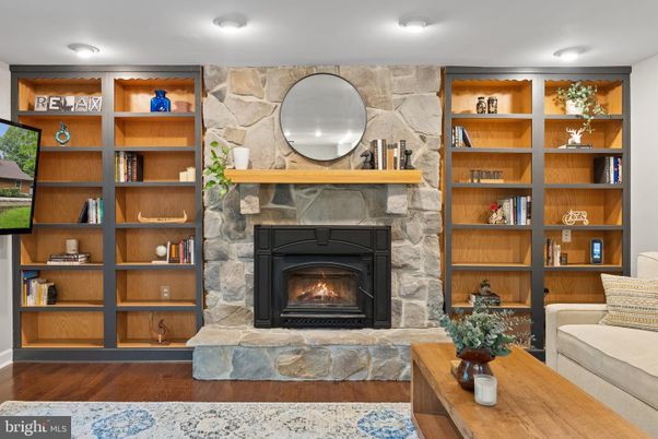 Fireplace, Interior, Recessed Lighting, Stone Walls, Wood Texture Flooring
