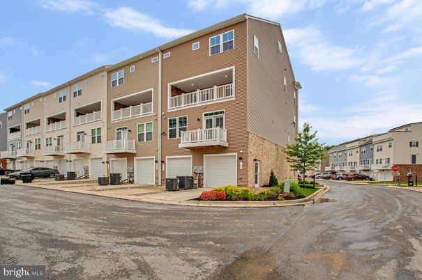 Attached, Exterior, Facade, Condo Building