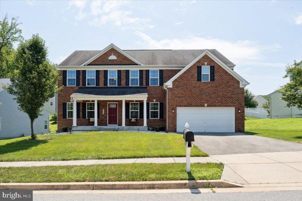 Attached, Exterior, Facade, Brick Facade, Brick Traditional