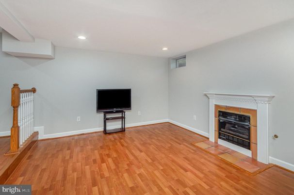 Empty room, Fireplace, Interior, Recessed Lighting, Wood Texture Flooring