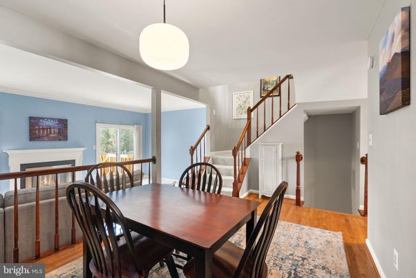 Dining room, Fireplace, Interior, Pendant Lights, Wood Texture Flooring