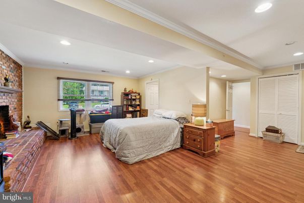 Bedroom, Fireplace, Interior, Recessed Lighting, Wood Texture Flooring