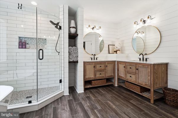 Bathroom, Dual Sink Vanities, Glass Shower, Interior, Recessed Lighting, Wood Texture Flooring