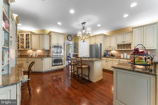 Chandelier, Interior, Kitchen, Recessed Lighting, Stainless Steel Appliances, Wood Texture Flooring