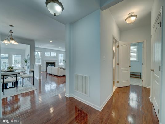 Dining room, Fireplace, Interior, Living room, Pendant Lights, Recessed Lighting, Wood Texture Flooring