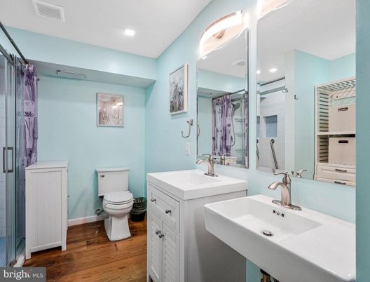 Bathroom, Dual Sink Vanities, Interior, Recessed Lighting, Wood Texture Flooring