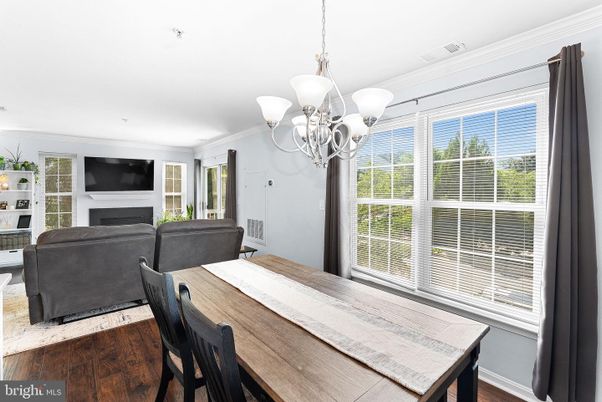 Chandelier, Dining room, Fireplace, Interior, Living room, Wood Texture Flooring