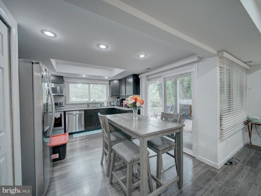 Dining room, Interior, Kitchen, Recessed Lighting, Stainless Steel Appliances, Wood Texture Flooring