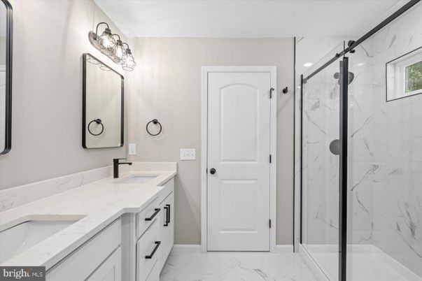 Bathroom, Dual Sink Vanities, Glass Shower, Interior, Marble, Marble Walls