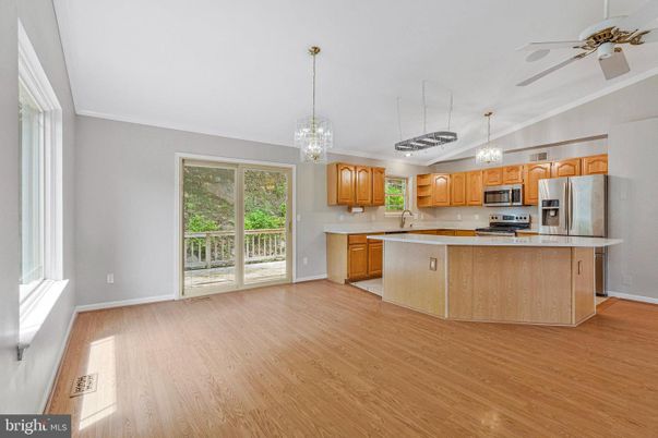 Chandelier, Interior, Kitchen, Pendant Lights, Stainless Steel Appliances, Wood Texture Flooring
