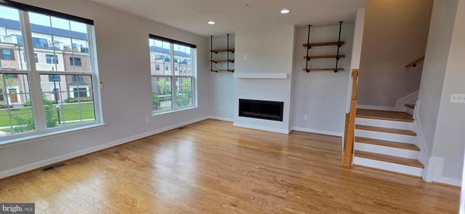 Empty room, Fireplace, Interior, Recessed Lighting, Wood Texture Flooring