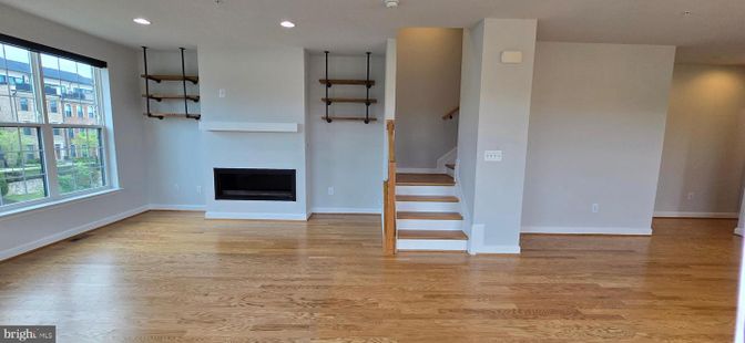 Empty room, Fireplace, Interior, Recessed Lighting, Wood Texture Flooring