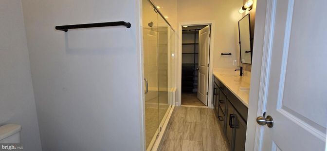 Bathroom, Dual Sink Vanities, Glass Shower, Interior, Walk-in Closets, Wood Texture Flooring